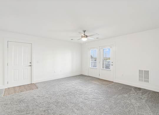 A spacious room with a ceiling fan  at The Parker North Augusta, North Augusta, SC, 29841