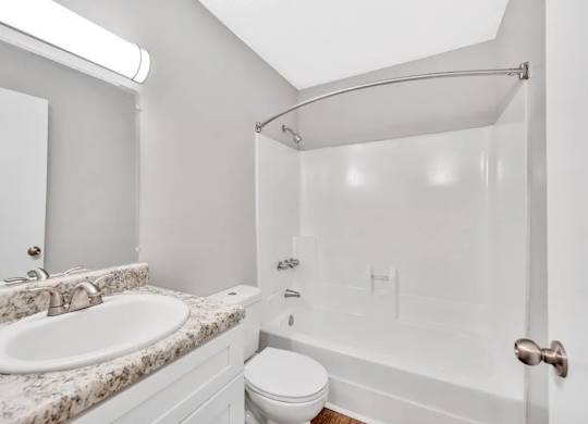 A White Bathroom at Avondale Place Apartments, Avondale Estates, GA, 30002