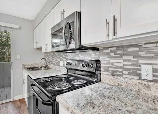 A Modern Kitchen at Avondale Place Apartments, Avondale Estates, GA