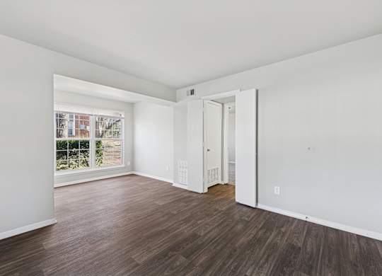 Room with white walls and window at Lexington on the Green, North Carolina