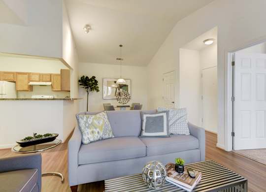 a living room with a couch and a coffee table