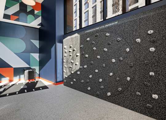A wall with a pattern of holes in it.