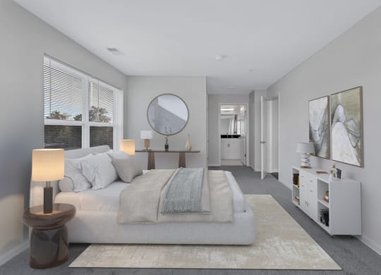 a bedroom with a bed and a mirror in a white room