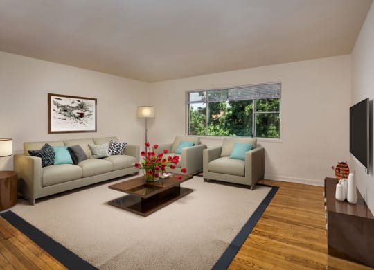 a living room with couches and a coffee table