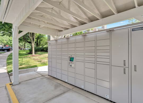 the lockers are tucked under the roof of the garage