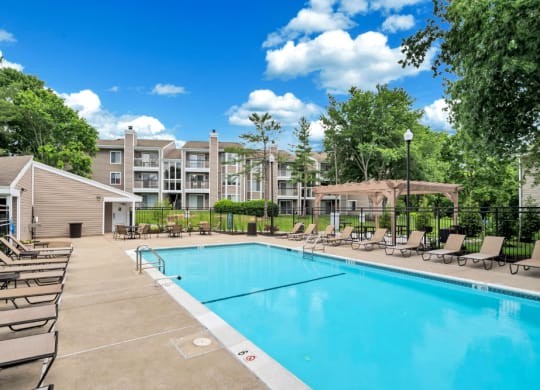 our apartments offer a swimming pool with chaise lounge chairs