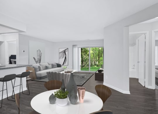 Livingroom and dining room view of an apartment home at Waterside at Reston.