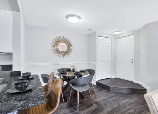 Renovated apartment homes at Waterside at Reston feature separate dining areas as well as bar seating.