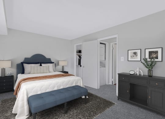 a bedroom with a bed and a dresser