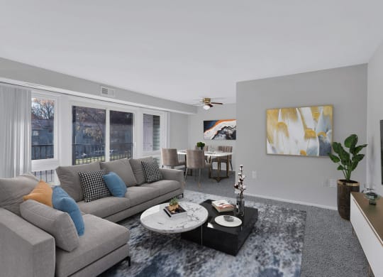 a living room with couches and a coffee table