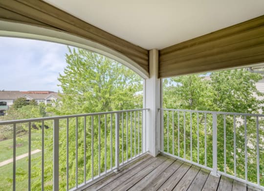 the view from the deck of a home with a balcony