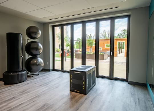 a large room with a large window and a cpu on the floor