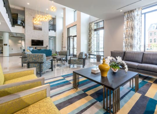 a living room with couches and a table