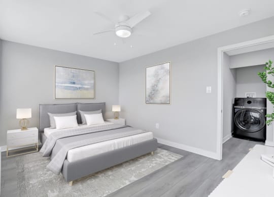 a bedroom with a bed and a ceiling fan