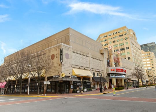 a large building on the corner of a city street