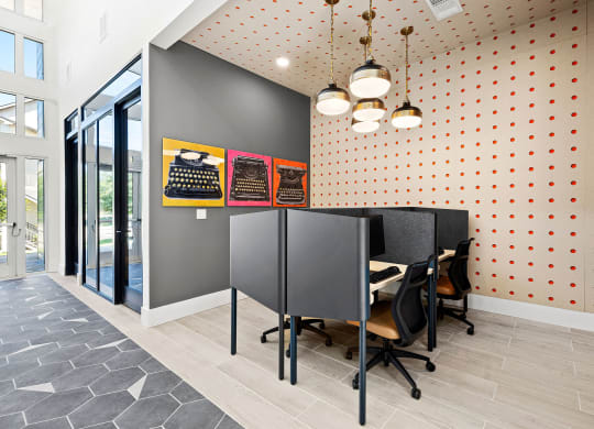 a dining area with a table and chairs in a room with a door