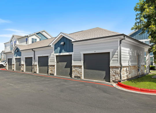 a row of garages at bexley at tech ridge apartments