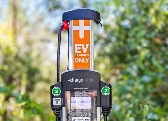 a gas pump with a charge only sign on it