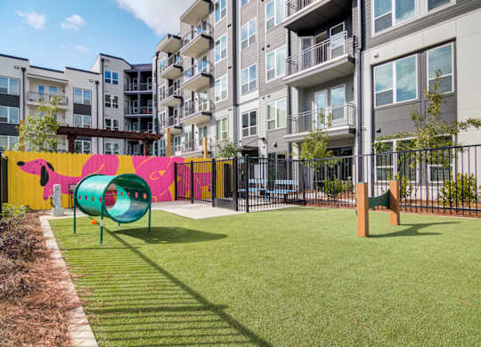 a playground in front of an apartment building