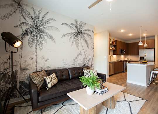 a living room with a couch and a table