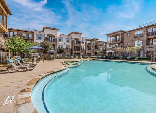 the swimming pool at the preserve at polo terrace apartments