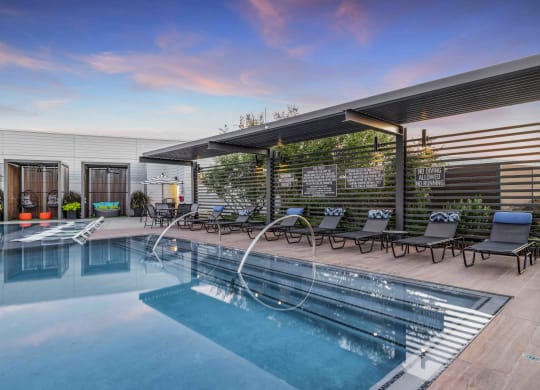 Rooftop Infinity Pool with Outdoor Lounge and Cabanas