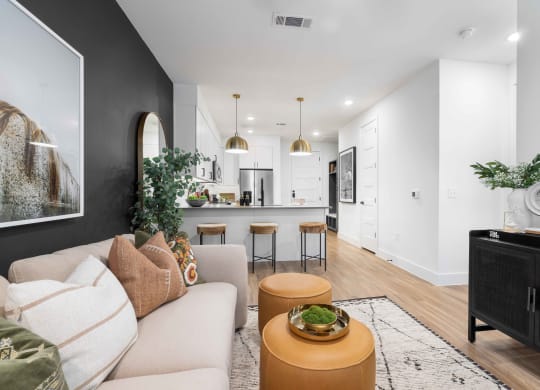 a living room with a couch and a table