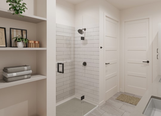 a white bathroom with a shower and a sink
