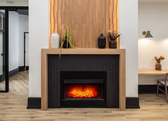 a fireplace with a woodeneworkework above it in a living room