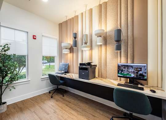 a home office with a desk and a computer
