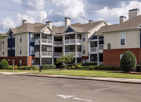 an apartment building on the corner of a street