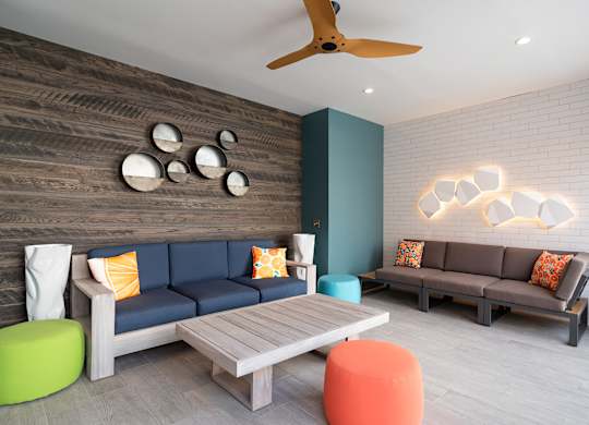 a living room with couches and a coffee table