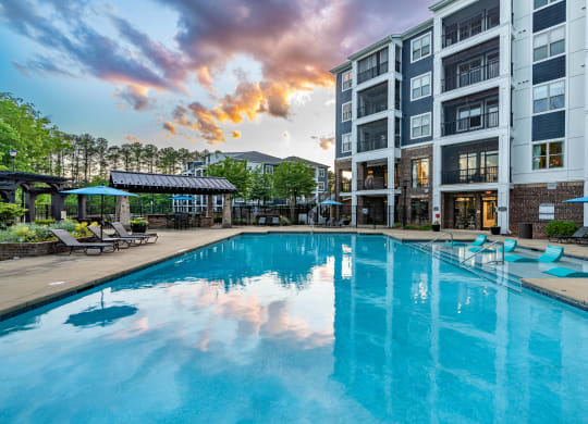 the swimming pool at the flats at big tex apartments