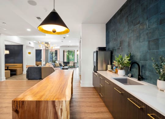 a kitchen with a wooden counter top and a sink