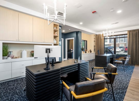 a conference room with a long desk and chairs