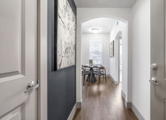 entry and foyer to the griffith model. large windows allow for natural light to fill the room.