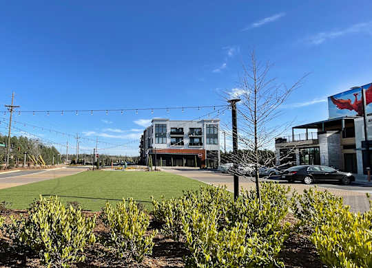 a soccer field in front of a building