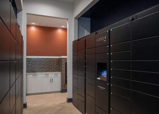 a row of lockers in a locker room with a door