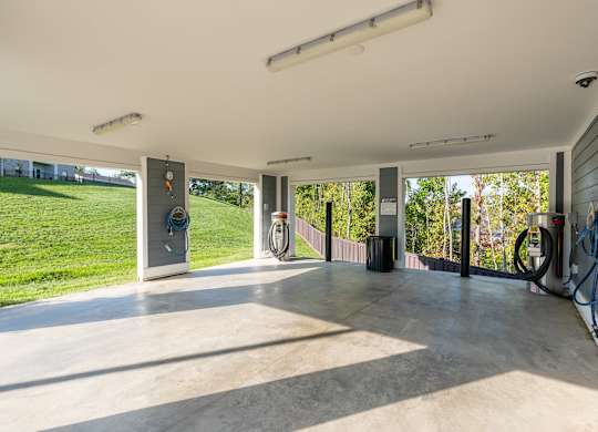 A garage with a concrete floor and a white ceiling.