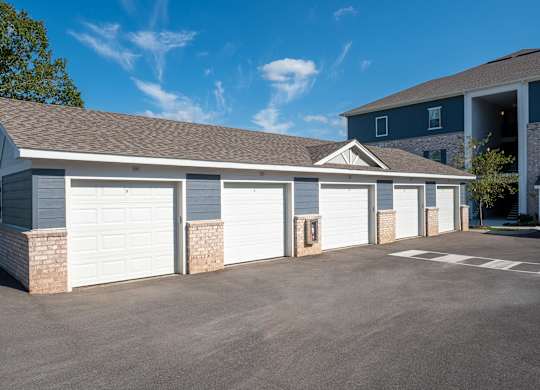 A two-story house with a garage.