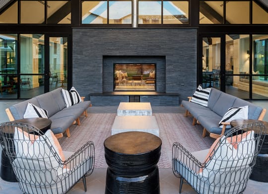 Outdoor Entertainment Lounge with Fireplace and TVs