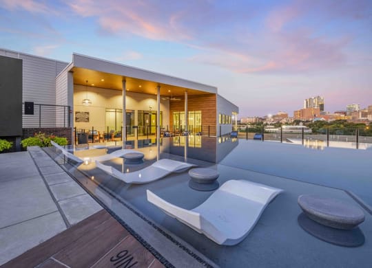 the home has a rooftop pool with views of the city