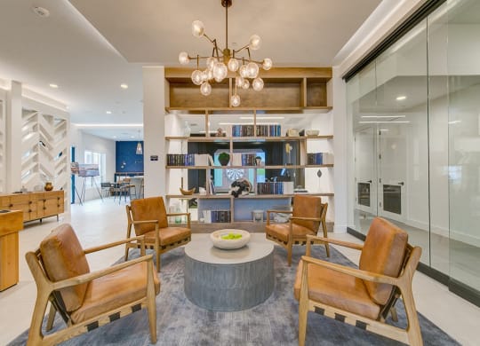 a living room filled with furniture and a table