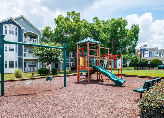 our apartments have a playground with a slide and swing set