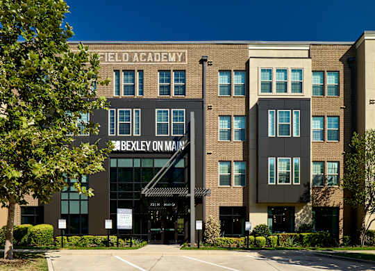 A building with the words Field Academy on the top of it.