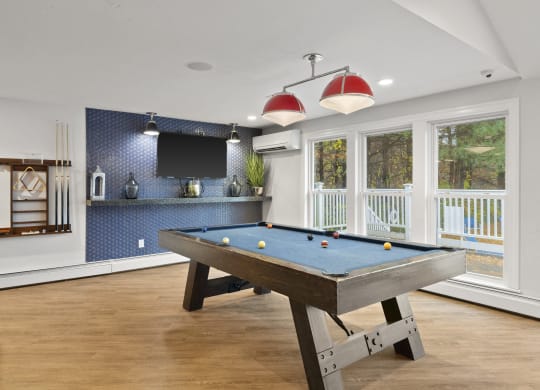 Game Room With Billiards And Shuffleboard at Heritage at the River, Manchester