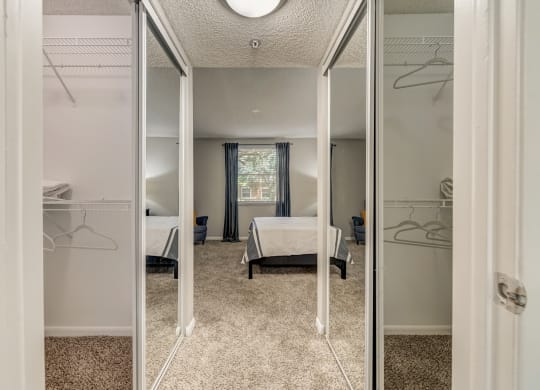 Hallway with two closets on both sides leading to the bedroom at Pembroke Pines Landings, Pembroke Pines, FL, 33025