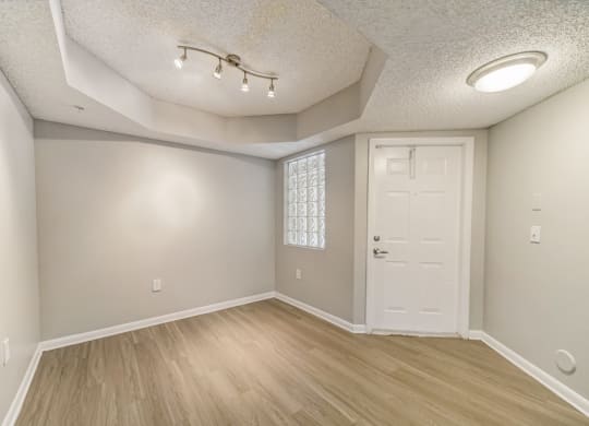 Dining room area with wood style floors at Pembroke Pines Landings, Pembroke Pines, FL, 33025