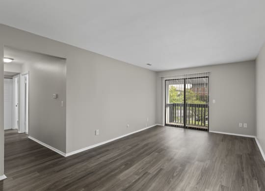Livingroom with wood style flooring at Creve Coeur, Creve Coeur, MO