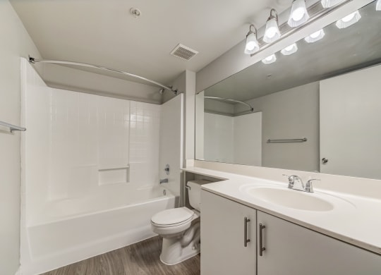 Bathroom with tub/shower combo, toilet and sink at Pembroke Pines Landings, Pembroke Pines, FL, 33025
